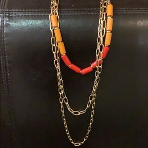 Gold necklace with orange & red beads (3 tiers)